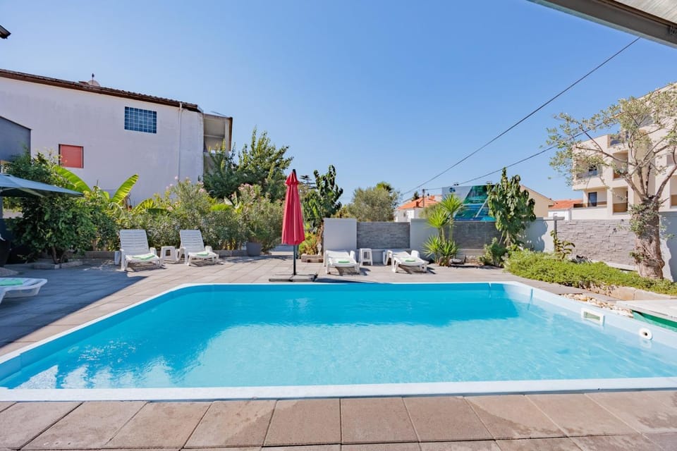 Patio, Day, Natural landscape, Garden, Garden view, Pool view, Swimming pool, sunbed