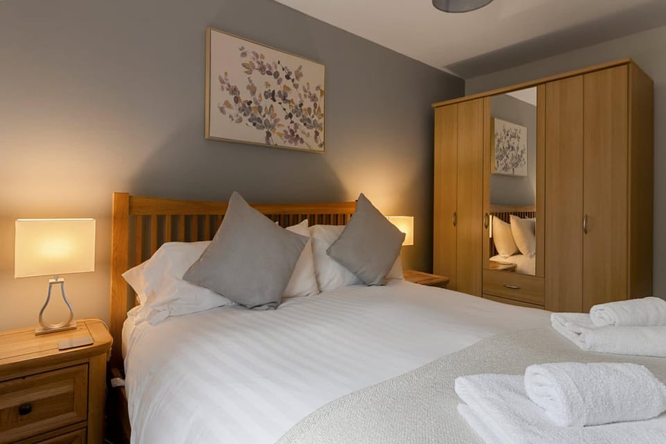 Bed, Decorative detail, Bedroom, Pets, pet friendly, towels, wardrobe