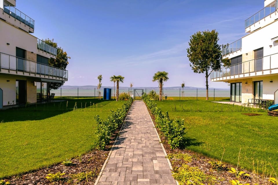 Property building, Day, Garden, View (from property/room), Garden view, Lake view