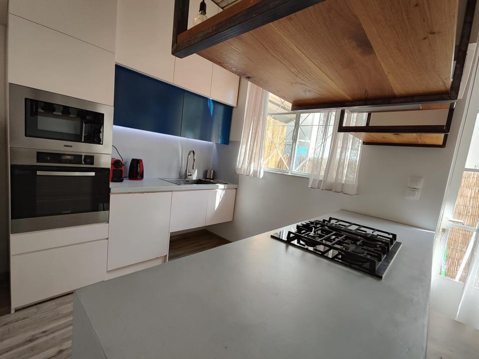Kitchen or kitchenette, oven, stove