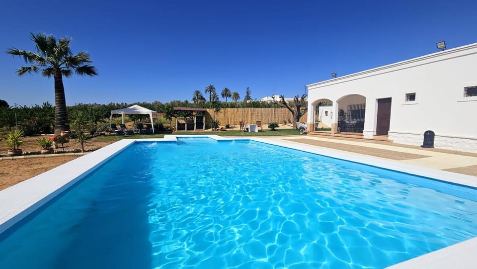 Property building, Living room, Swimming pool