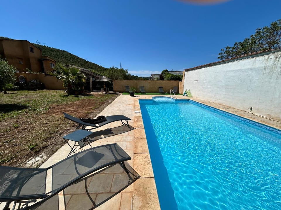 Property building, Living room, Swimming pool