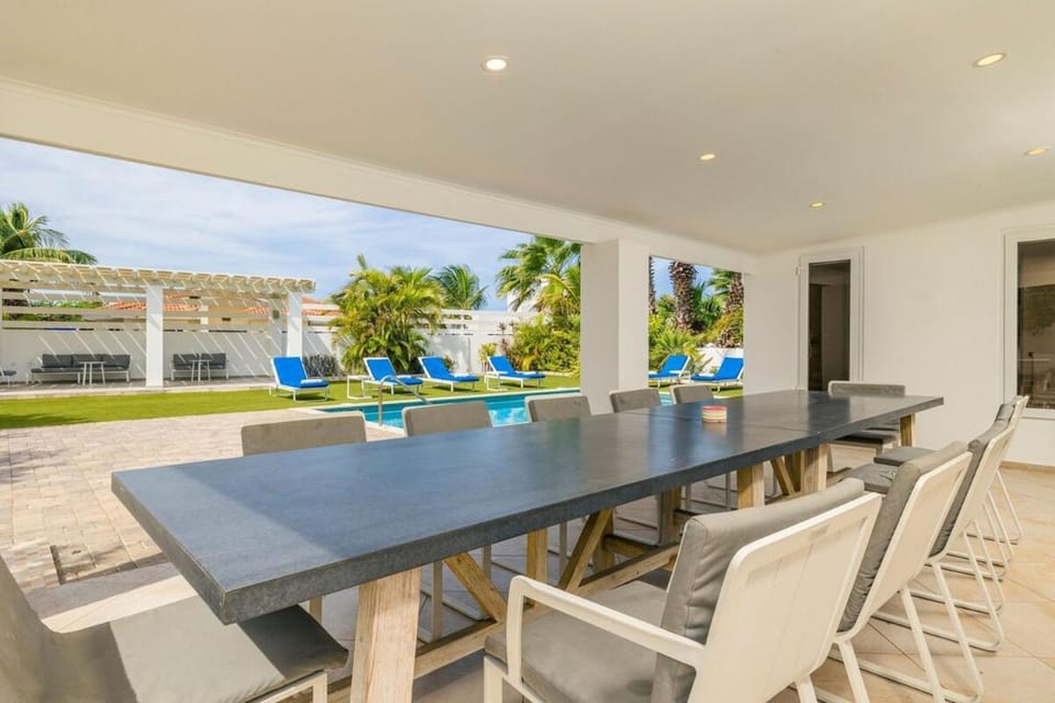 Patio, Dining area, Pool view