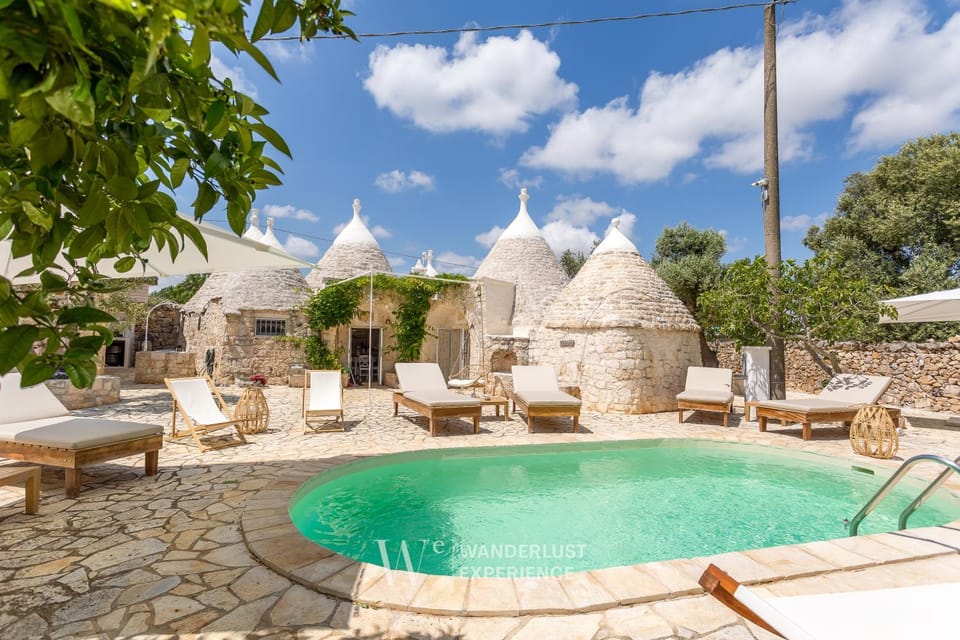 Patio, Day, Natural landscape, Pool view, Swimming pool, sunbed