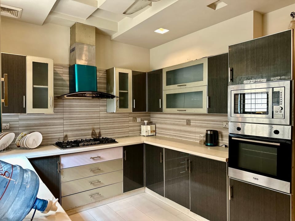 Kitchen or kitchenette, oven, stove