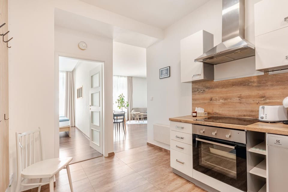 Kitchen or kitchenette, dishwasher, oven, stove