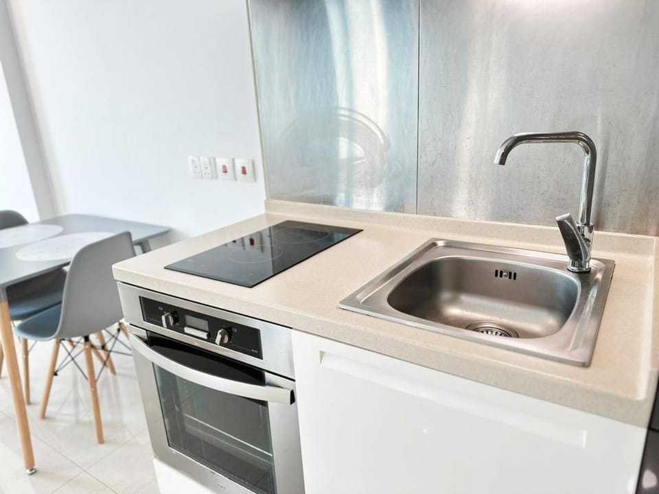 Kitchen or kitchenette, oven