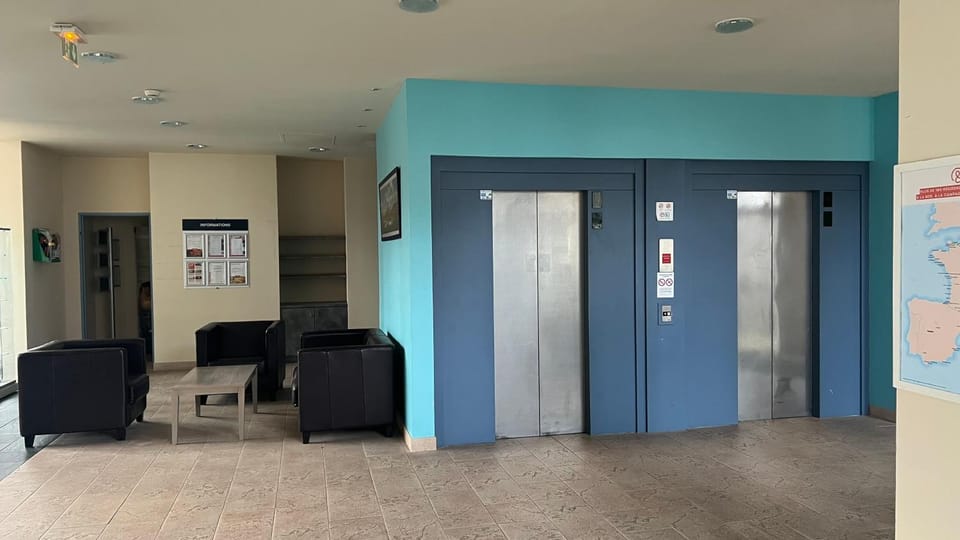 Property building, elevator