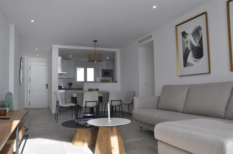 Kitchen or kitchenette, Living room, Seating area, Dining area