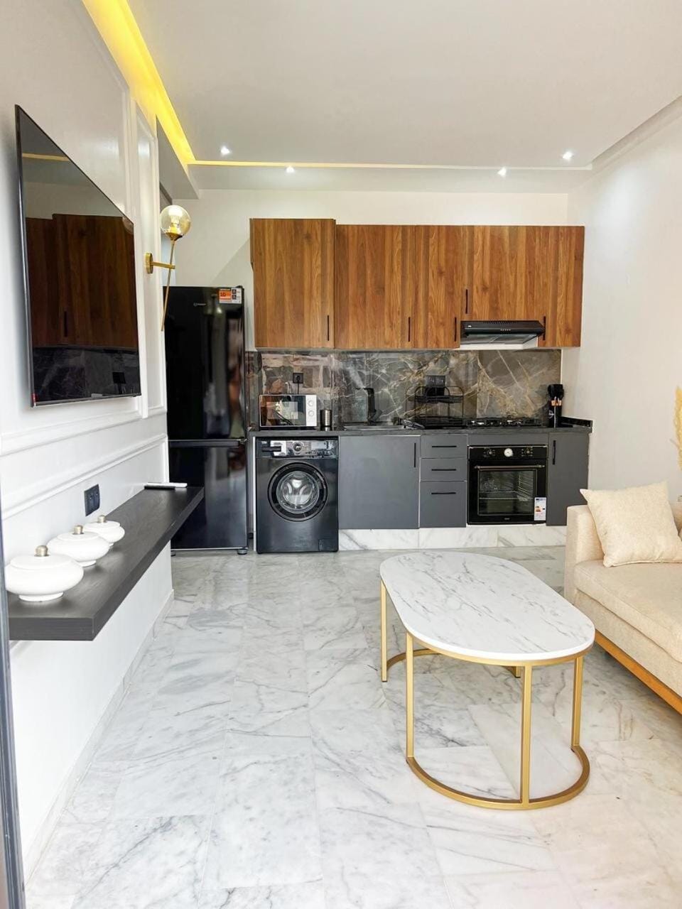 Kitchen or kitchenette, Seating area, Dining area, oven, stove, washing machine, dryer
