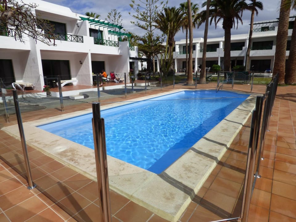 Property building, Patio, Swimming pool, Swimming pool