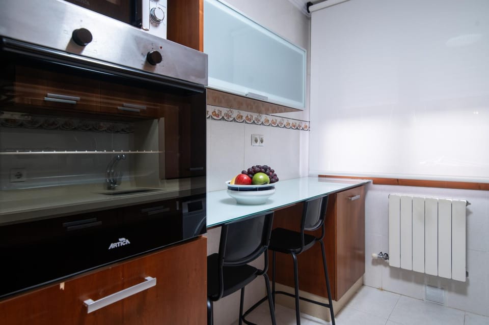 Kitchen or kitchenette, microwave, oven, stove, kitchen