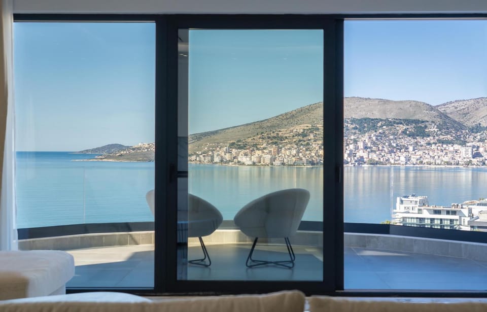 View (from property/room), Balcony/Terrace, Living room, Seating area, Sea view