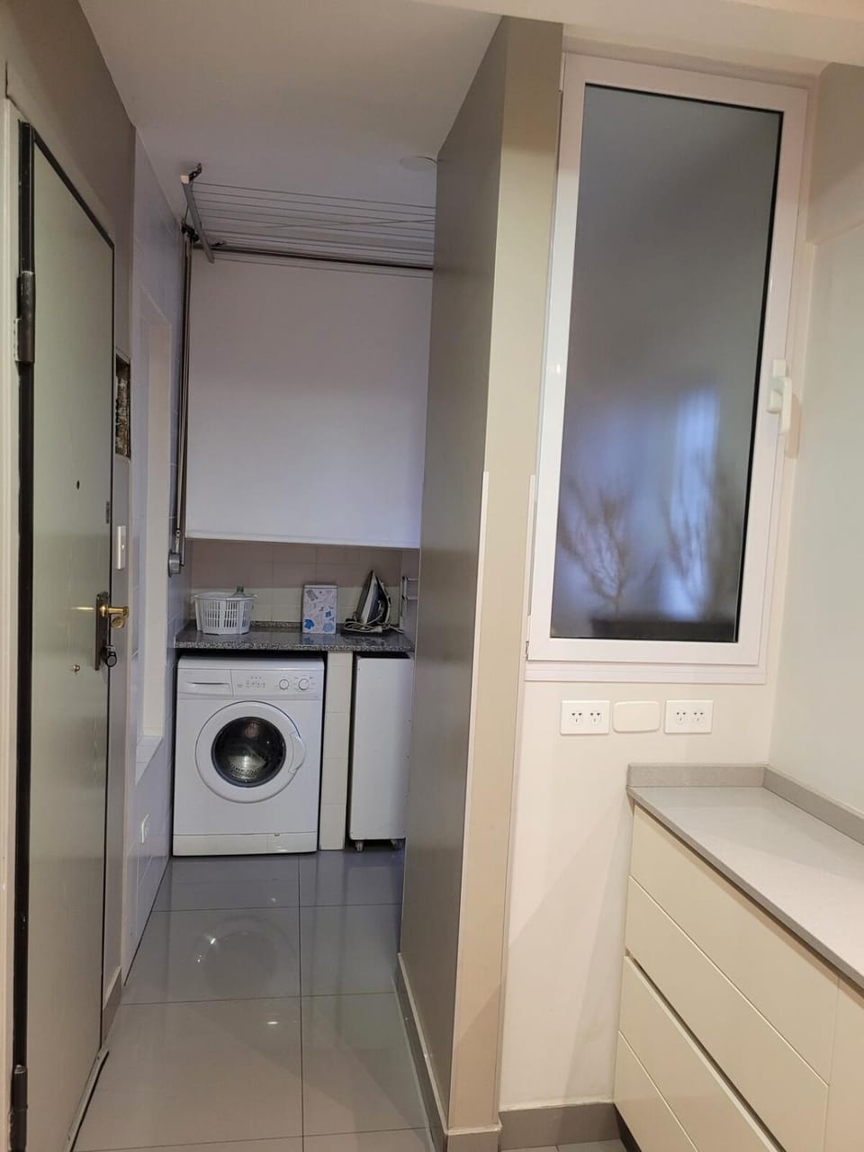 Kitchen or kitchenette, washing machine