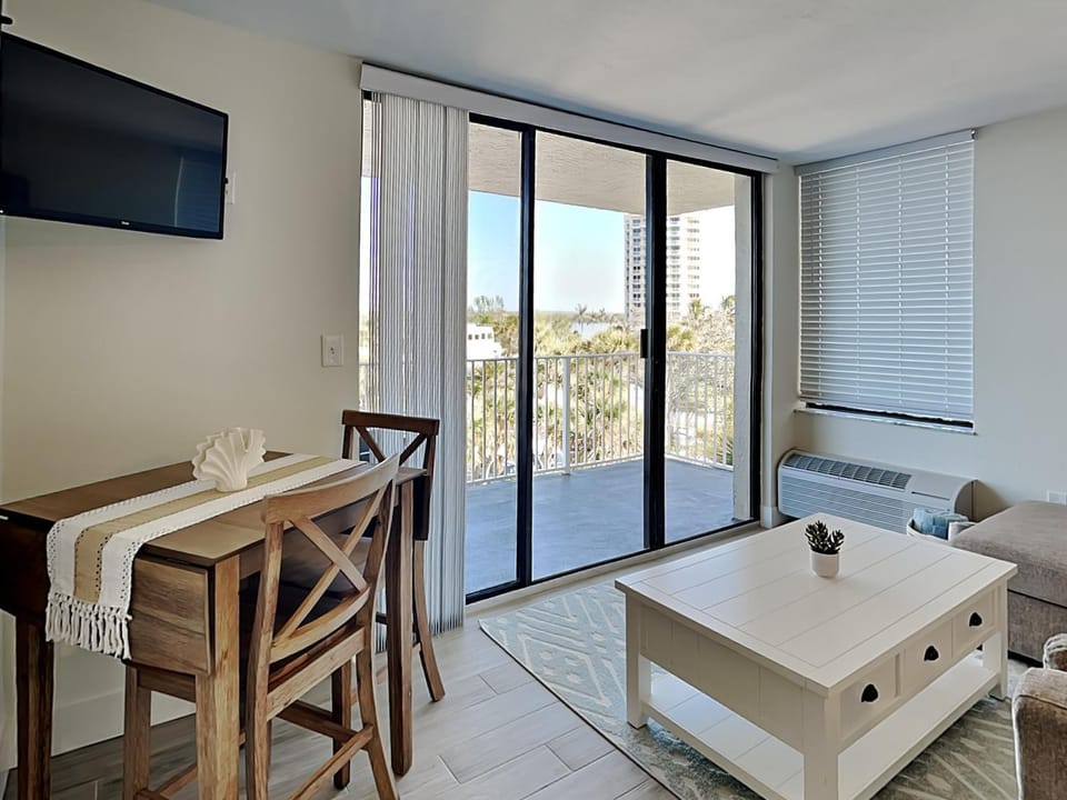 TV and multimedia, Balcony/Terrace, Living room, Seating area, furniture, air conditioner