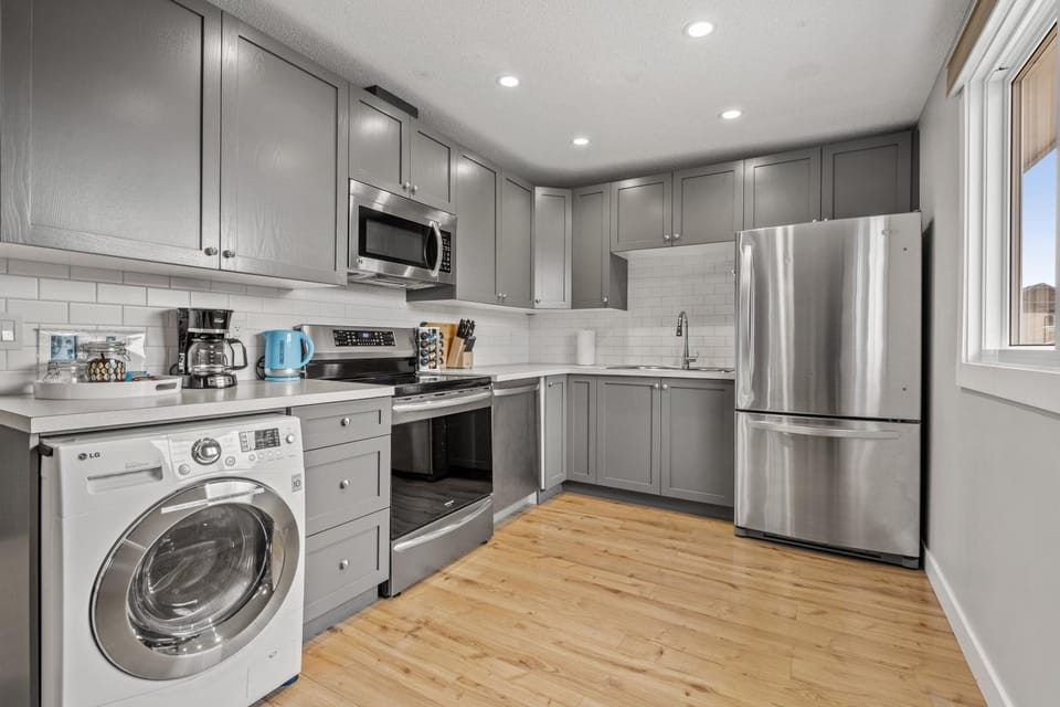 Kitchen or kitchenette, dishwasher, microwave, oven, pet friendly, stove, toaster, washing machine, dryer