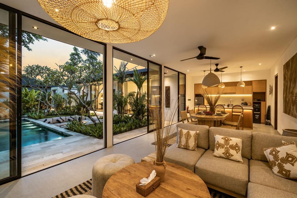 Property building, View (from property/room), Living room, Seating area, Pool view