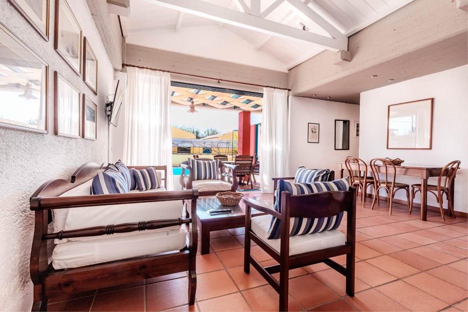 Living room, Seating area, Dining area, Pool view