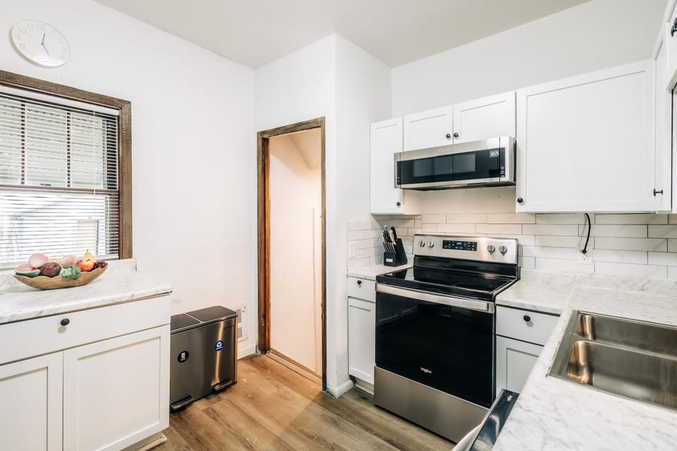 Kitchen or kitchenette, dishwasher, oven, stove, toaster