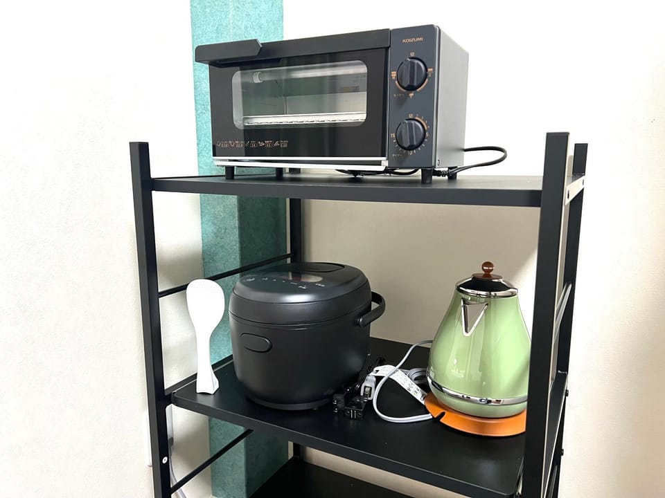 Kitchen or kitchenette, toaster