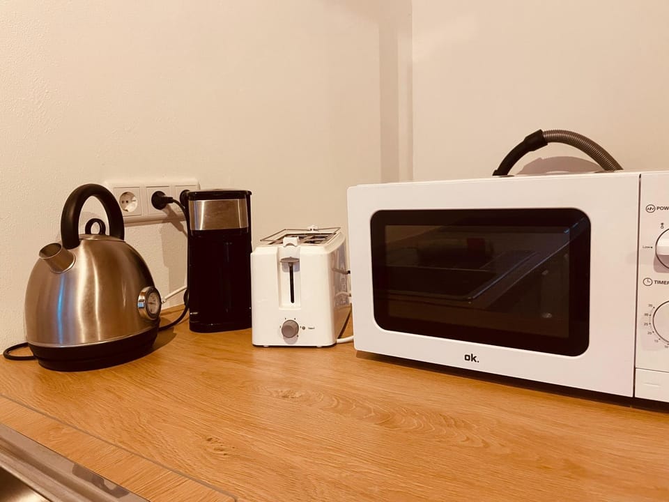 Kitchen or kitchenette, toaster