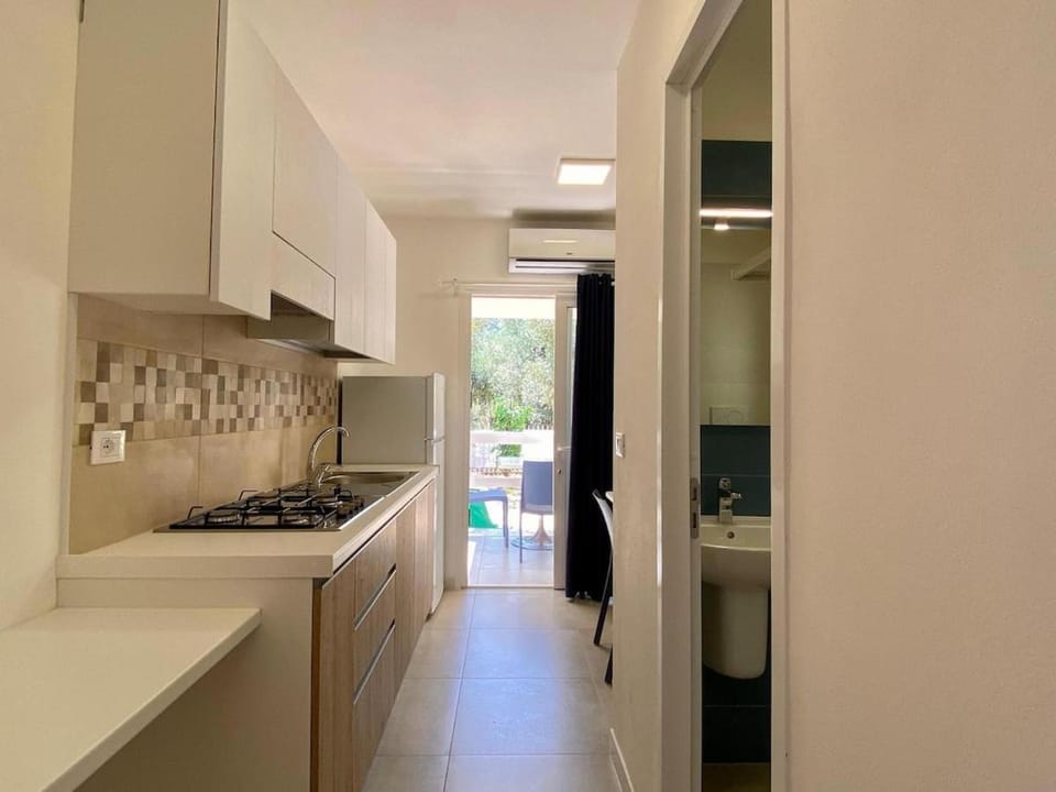 Kitchen or kitchenette, stove