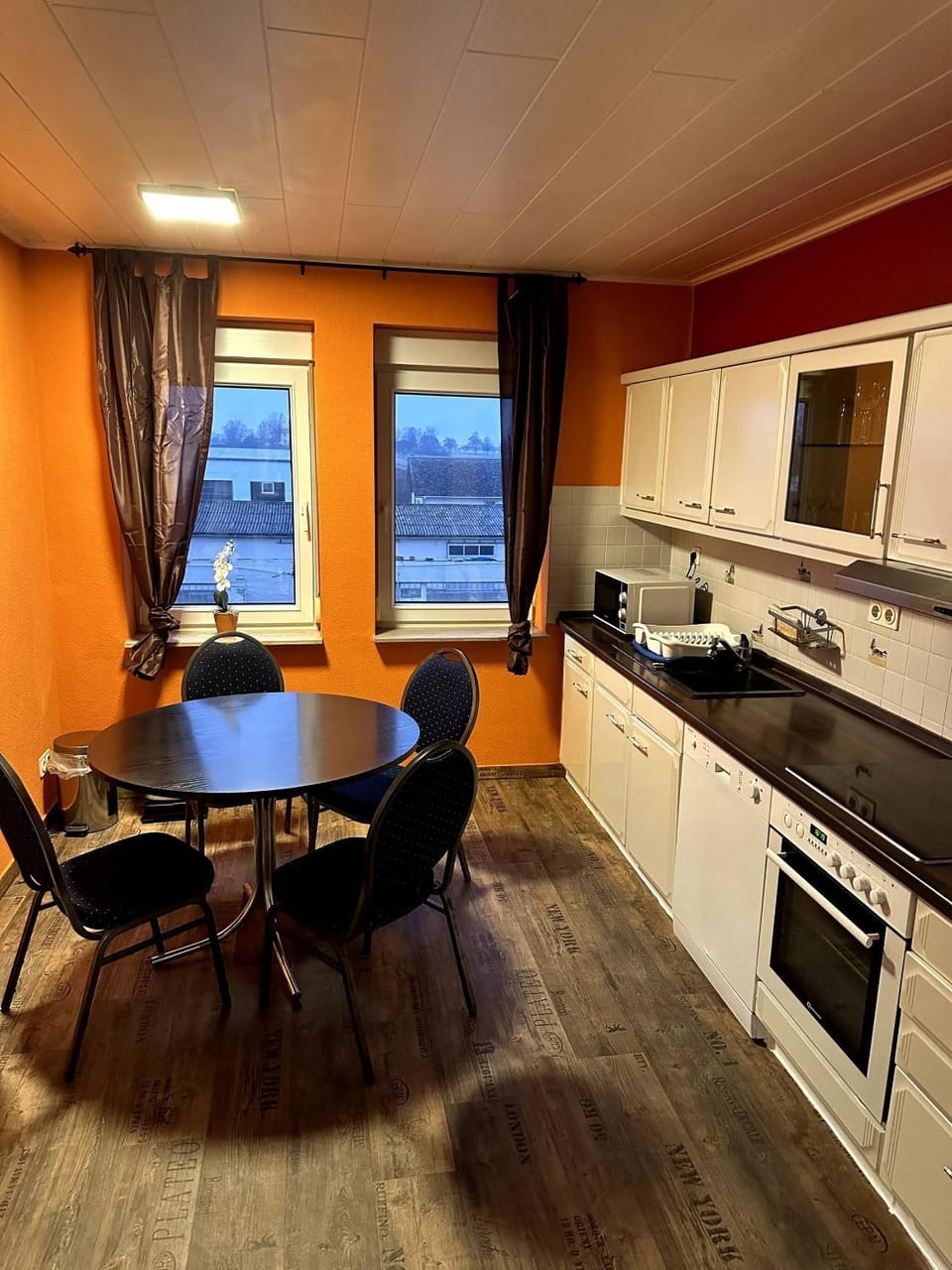 Dining area, microwave, oven, kitchen