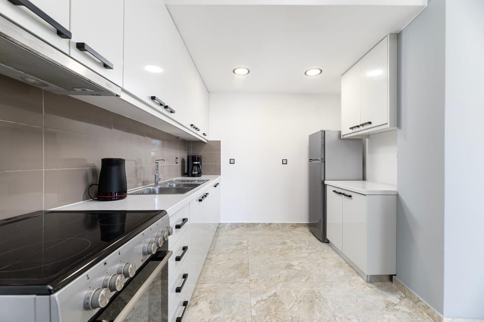 Kitchen or kitchenette, oven, stove