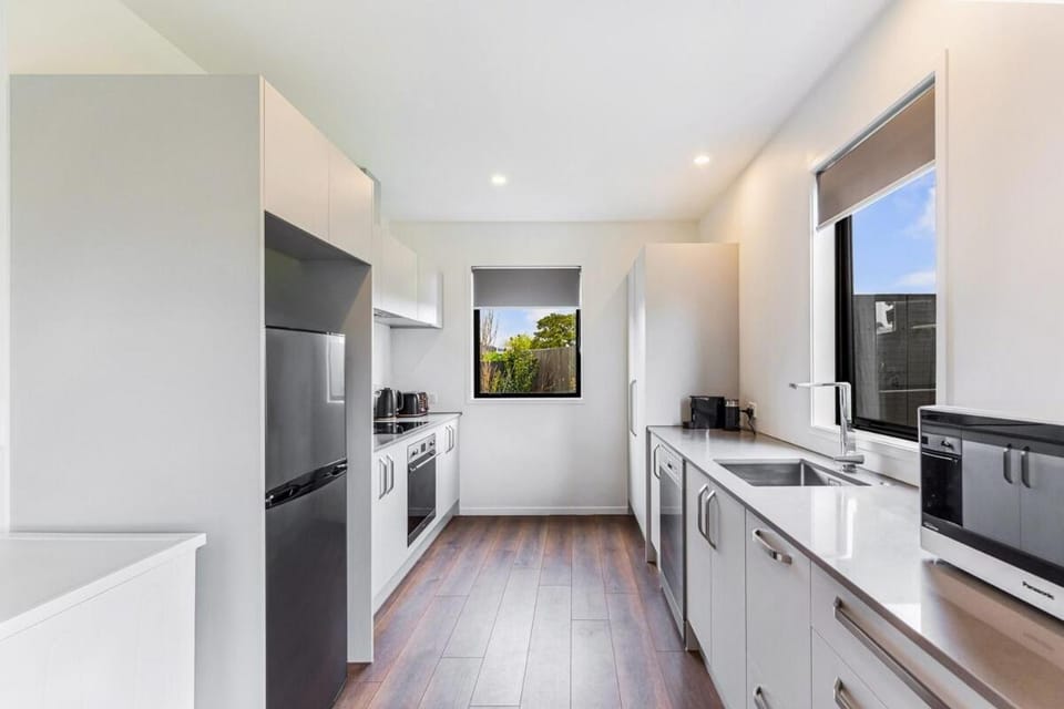 Kitchen or kitchenette, dishwasher, oven, stove