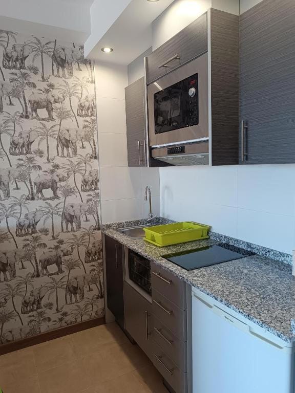 Kitchen or kitchenette, stove