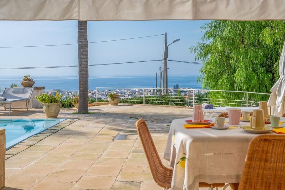 Day, Natural landscape, View (from property/room), Dining area, Pool view, Sea view, Swimming pool