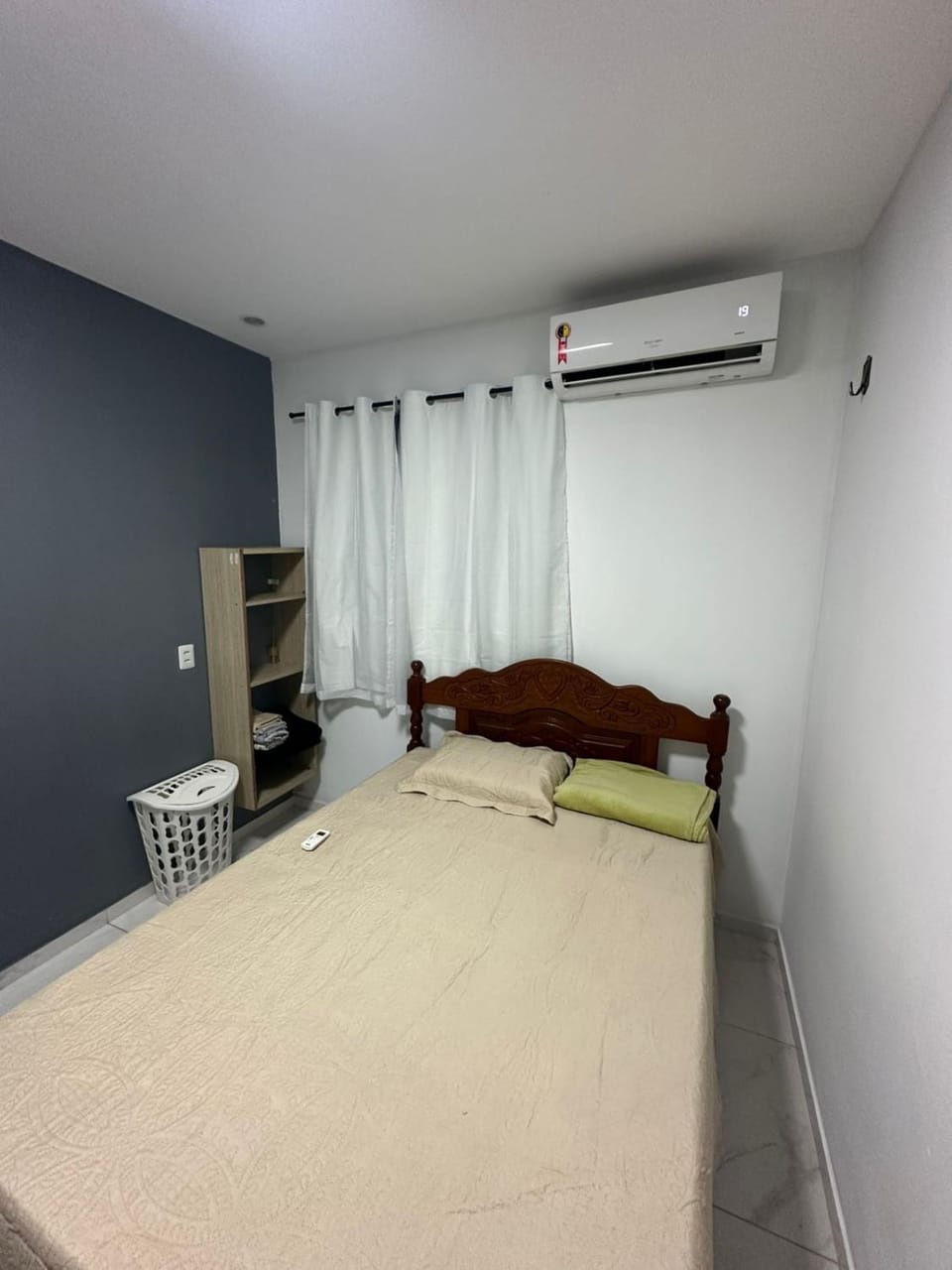 Photo of the whole room, air conditioner