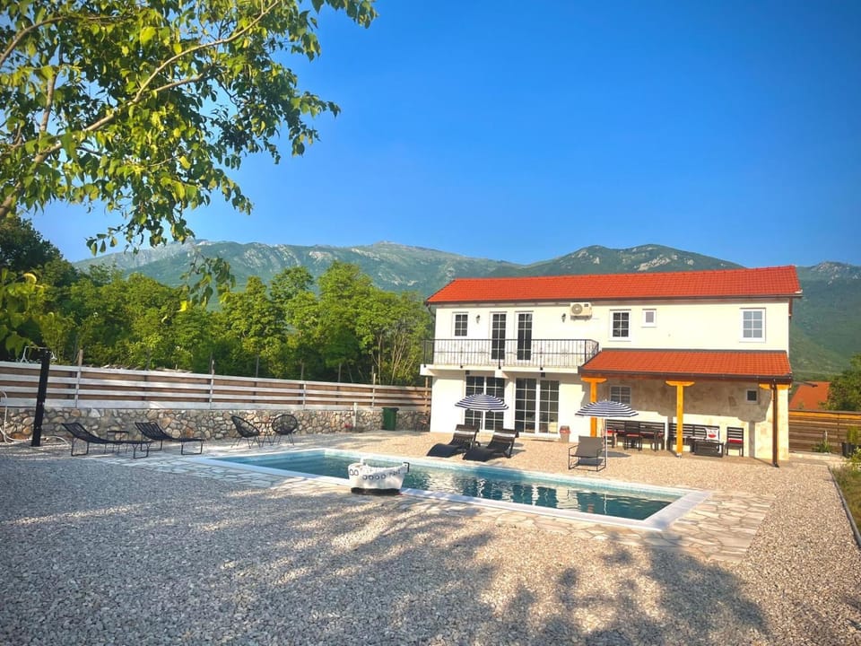 Property building, Natural landscape, Mountain view, Swimming pool