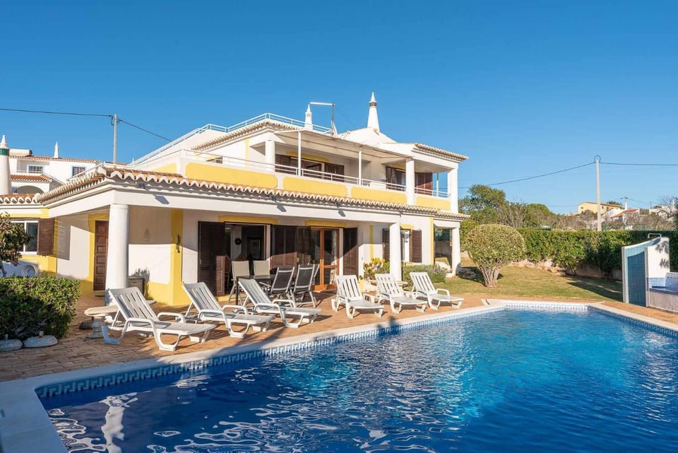 Property building, Living room, Swimming pool