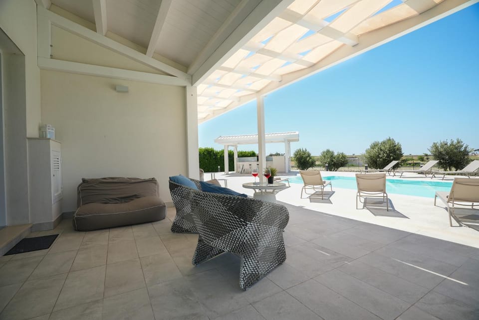Patio, Natural landscape, Pool view, Swimming pool, sunbed