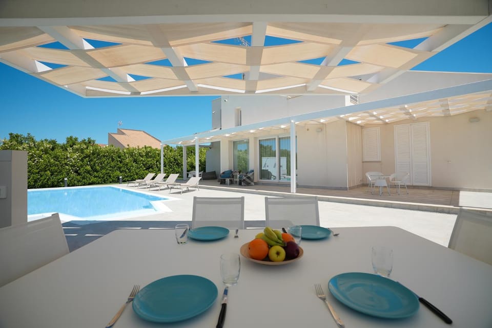Patio, Dining area, Pool view