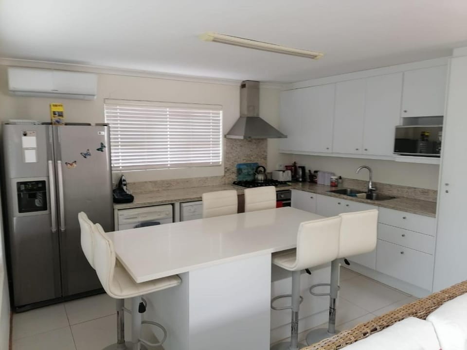 Kitchen or kitchenette, Dining area, dishwasher, stove, toaster