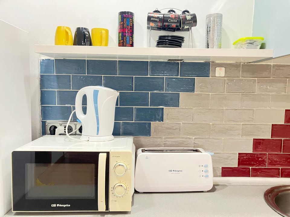 Kitchen or kitchenette, toaster
