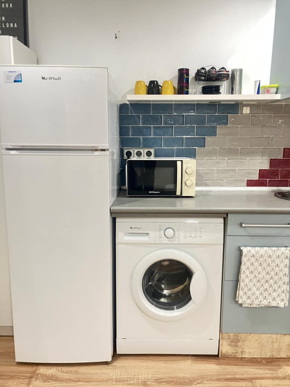 Kitchen or kitchenette, washing machine