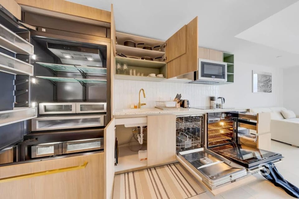 Kitchen or kitchenette, dishwasher, microwave, oven, stove, toaster