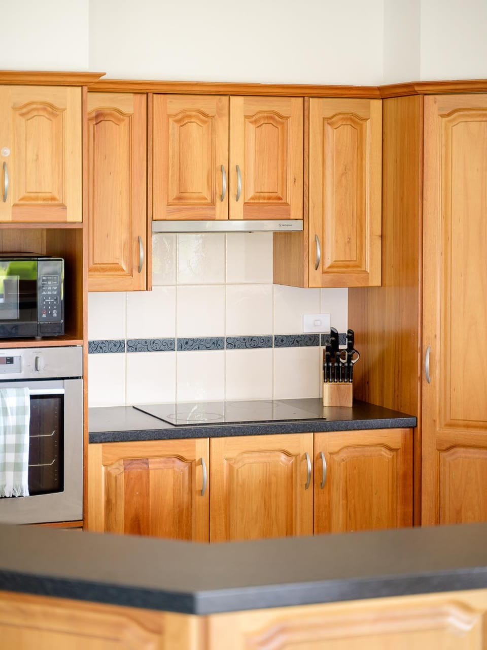 Kitchen or kitchenette, oven, stove