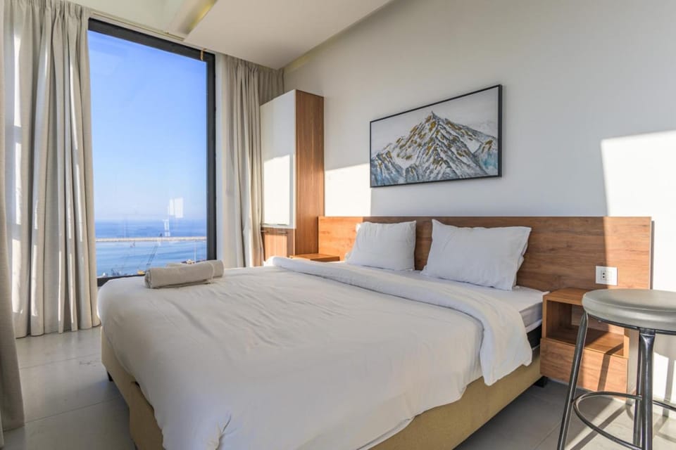 Bed, View (from property/room), Bedroom, Sea view, towels, wardrobe, air conditioner