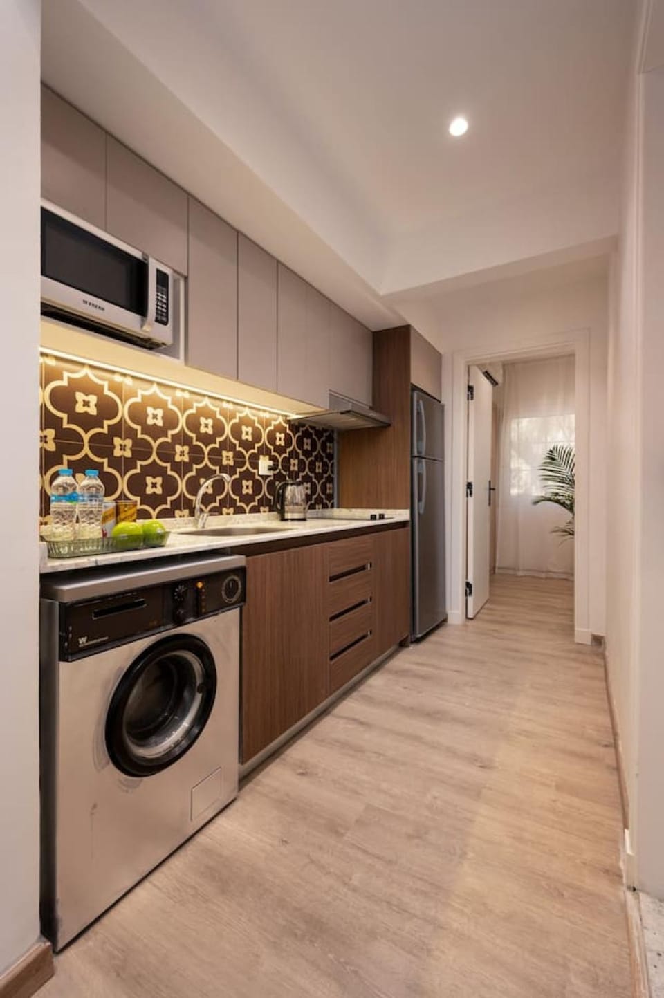 Kitchen or kitchenette, washing machine