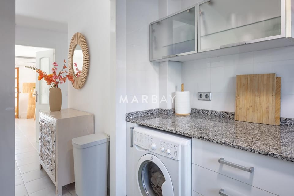 Kitchen or kitchenette, washing machine