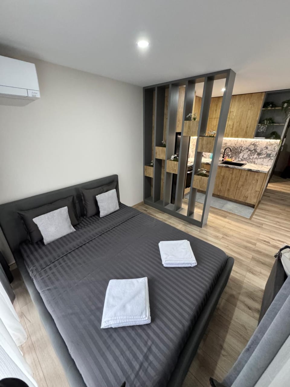 Bed, Bedroom, towels, air conditioner