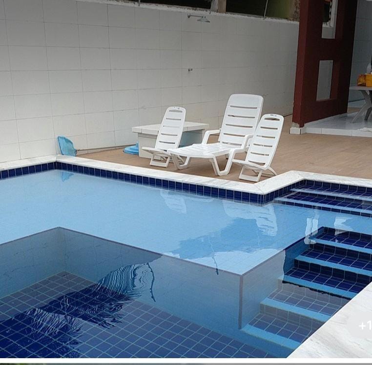 Swimming pool, sunbed