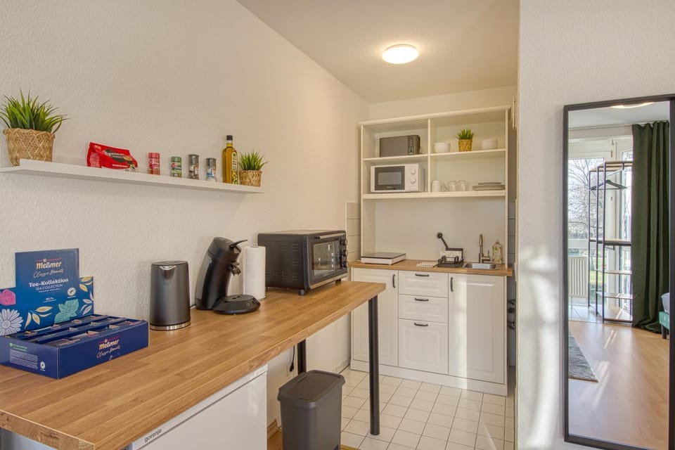 Kitchen or kitchenette, oven, stove, toaster, kitchen