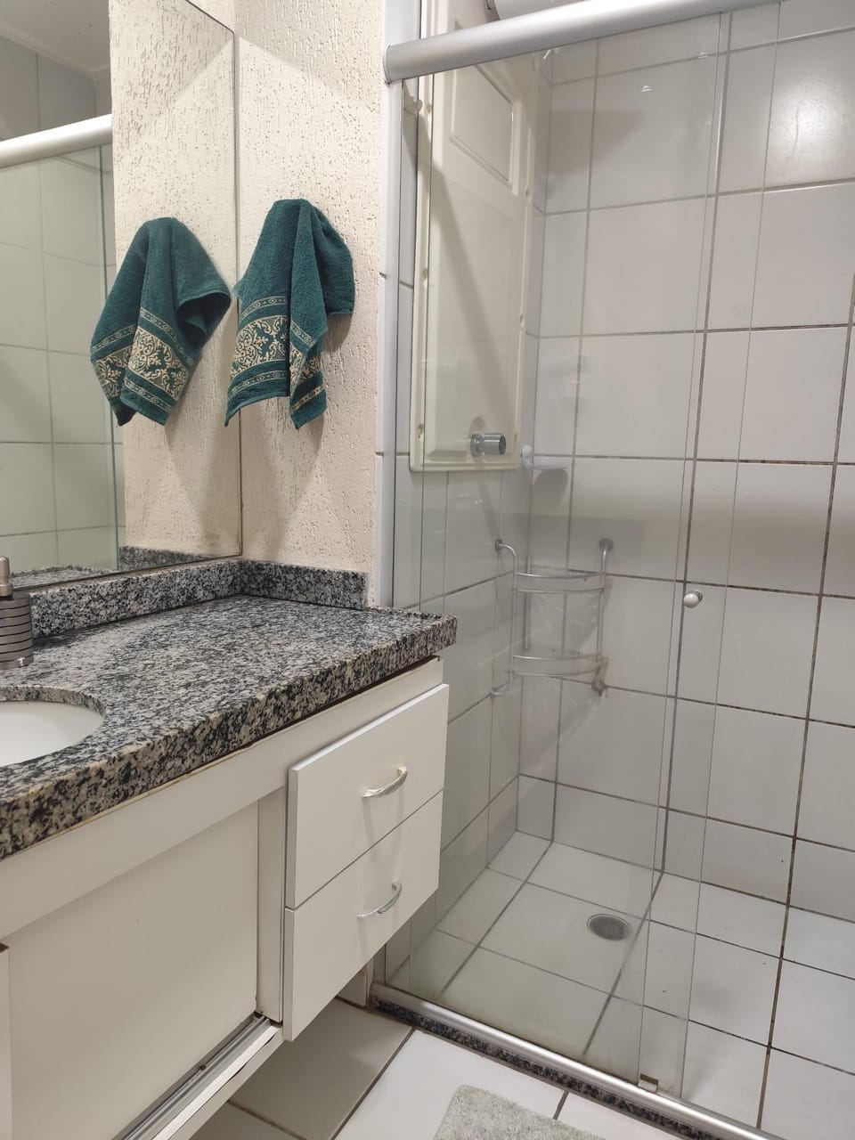 Shower, Toilet, Bathroom, hair dryier, towels
