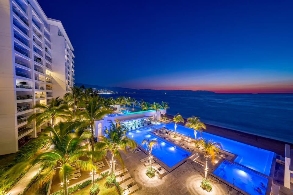 Property building, Night, Natural landscape, Beach, Pool view, Sea view, Swimming pool, sunbed