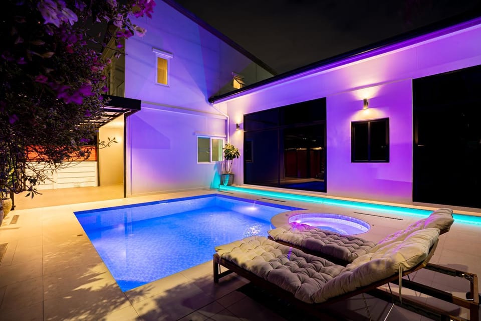 Patio, Night, Pool view, Swimming pool, sunbed